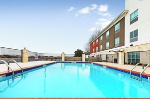 Seasonal outdoor pool, open 9:00 AM to 10:00 PM, sun loungers