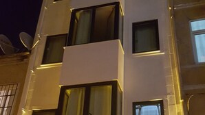 A multi-story building with balconies and large windows. - Taksim Soushian Hotel (Istanbul)
