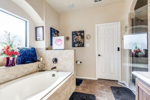 Combined shower/bathtub, hair dryer, towels, soap