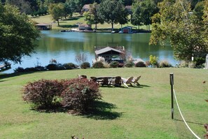 View of dock and firepit from deck