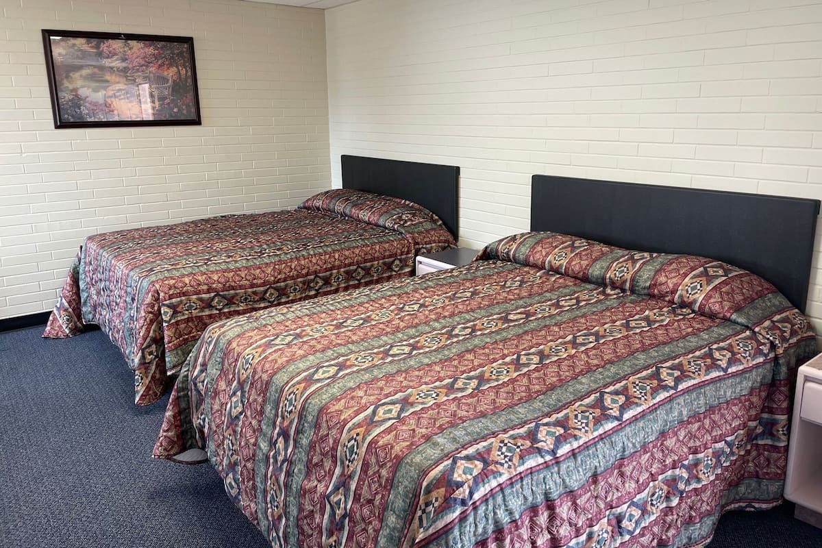 Basic Double Room, 2 Queen Beds, Non Smoking | Living area | TV