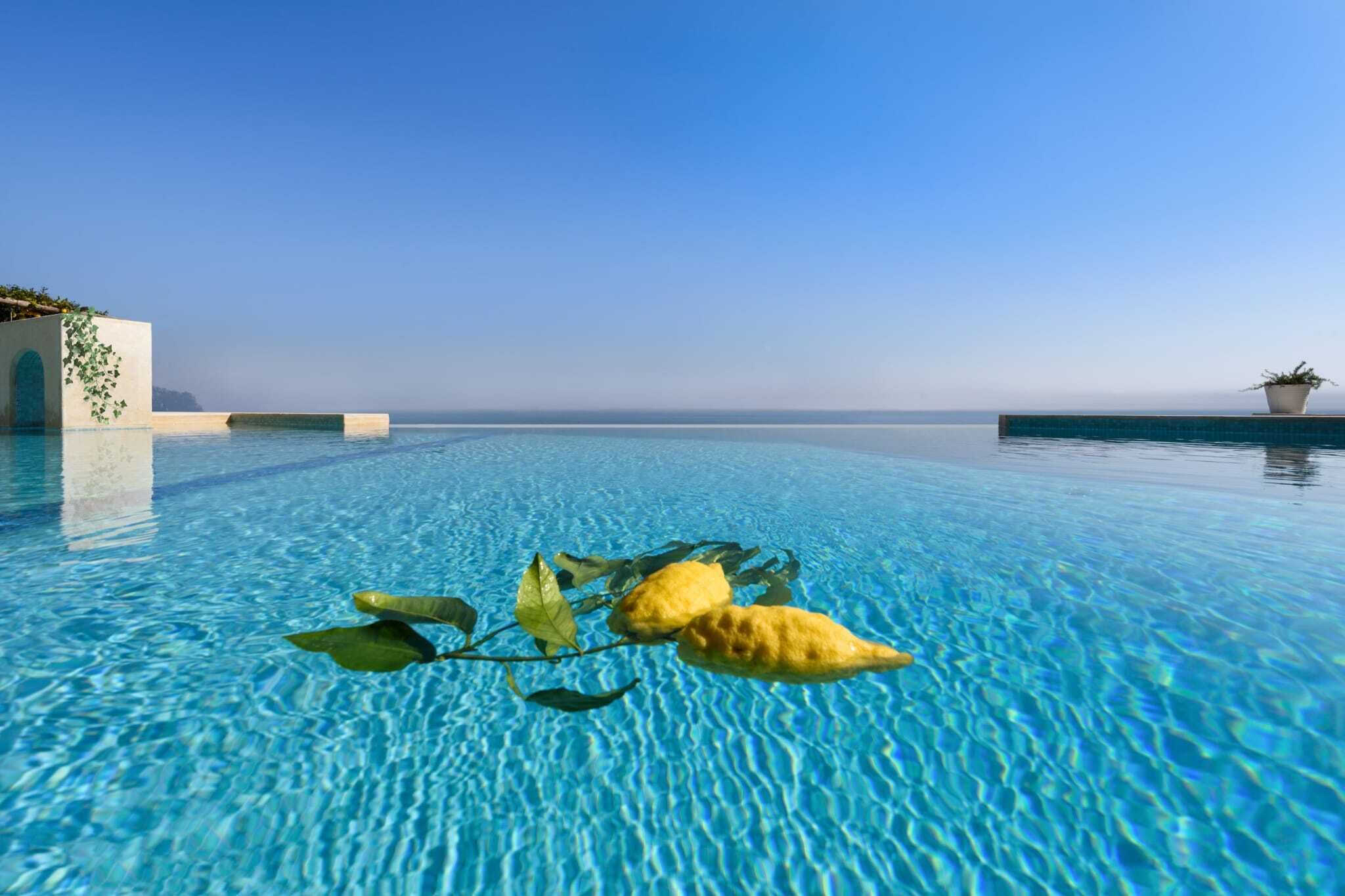 Outdoor pool, a heated pool, sun loungers