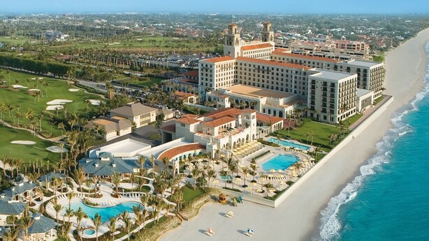 A resort with multiple buildings, a beach, and a pool area. - Luxury 2 bedroom condo on Palm Beach Island! (Palm Beach)