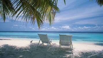 Beach nearby, sun loungers, beach towels