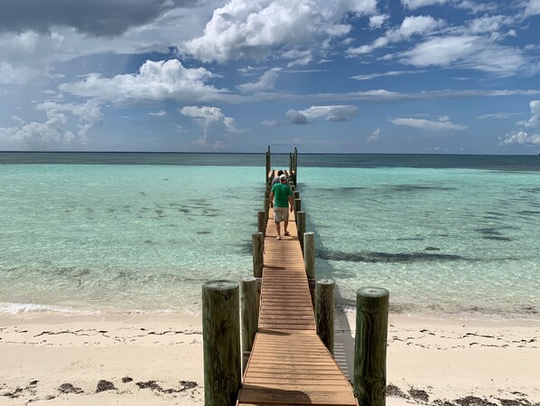 On the beach, sun loungers, beach towels