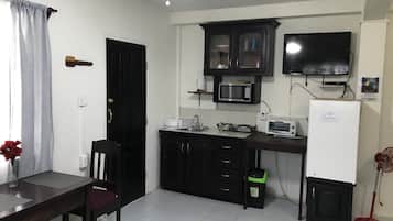Fridge, microwave, stovetop, coffee/tea maker