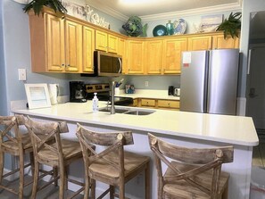 Fridge, microwave, oven, stovetop - BEACH FRONT 3 Bedroom & 3 Bathroom CONDO WITH AMAZING VIEWS! (Panama City Beach)