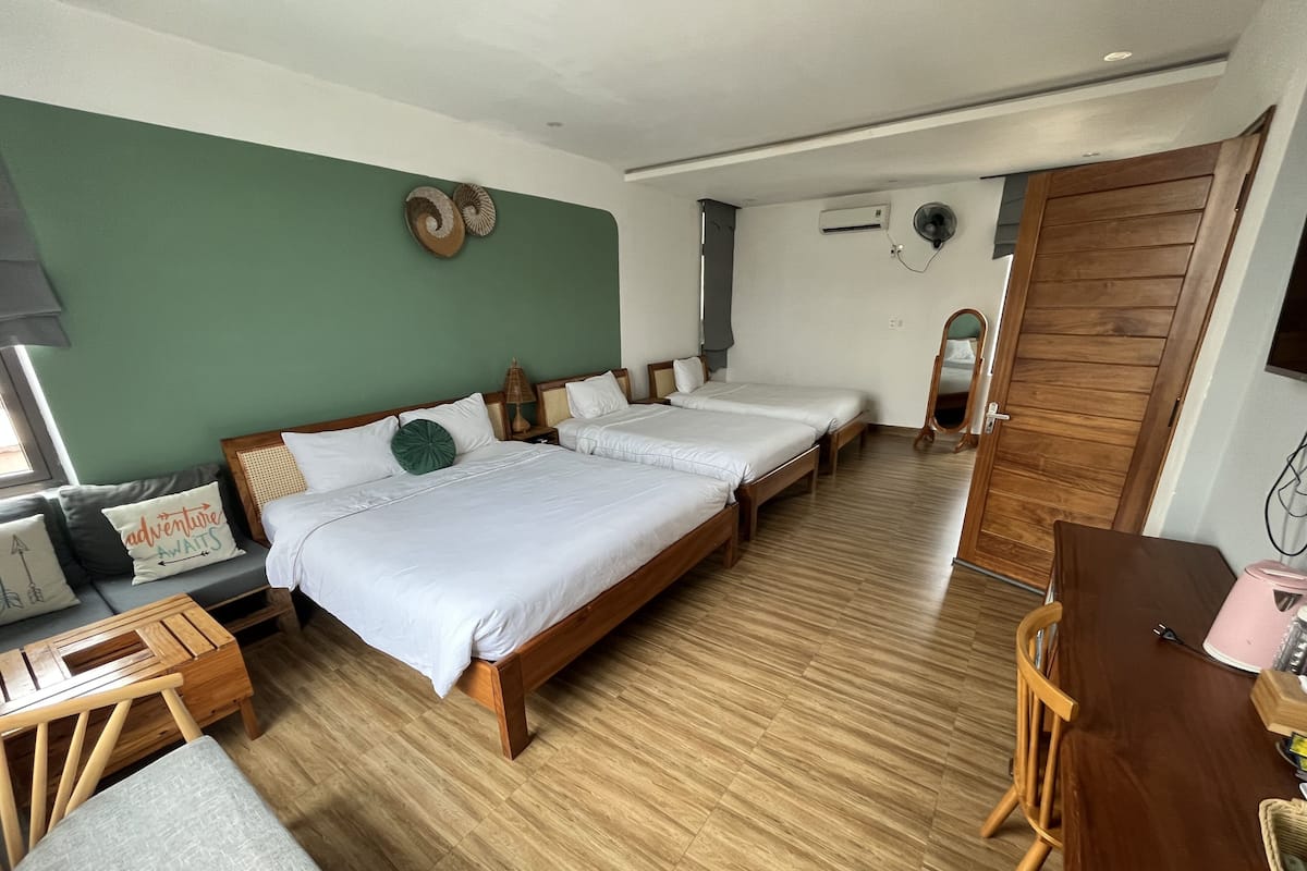 Classic Quadruple Room, 2 Bedrooms | Minibar, desk, blackout drapes, iron/ironing board
