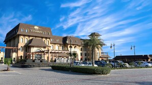 A large, historic building with a prominent sign reading "The VIVAAN". - The Vivaan Hotel & Resorts (Nilokheri)