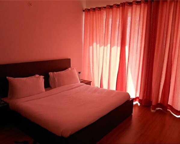 Minibar, coffres-forts dans les chambres, fer et planche à repasser