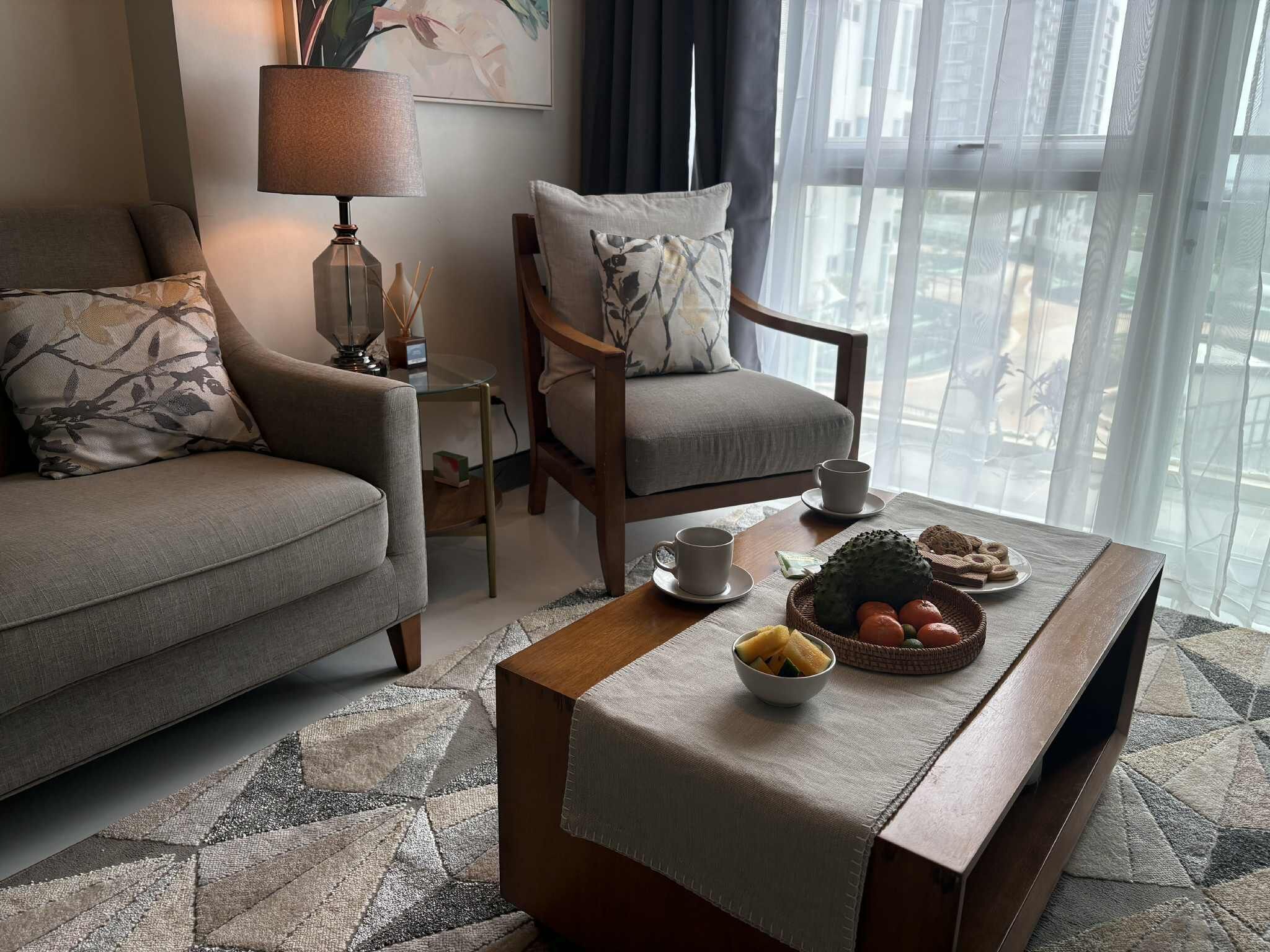 Deluxe Condo, Balcony, Mountain View | Living area | Flat-screen TV