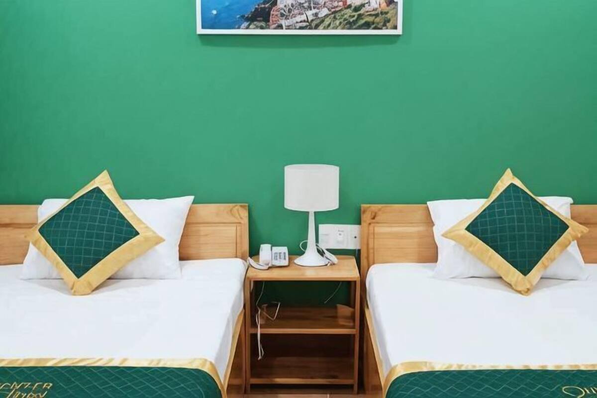 Premium bedding, desk, laptop workspace, blackout curtains