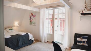 Deluxe dubbelrum - 1 queensize-sÀng | SÀngtillbehör av högsta kvalitet, minibar och individuell inredning