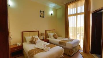 Premium bedding, in-room safe, desk, free WiFi