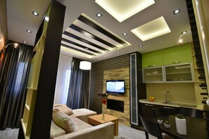 Apartment, 1 Bedroom, Terrace | Living area | Flat-screen TV