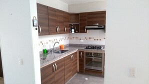 Family House, Multiple Beds, Accessible, Non Smoking | Private kitchen | Full-sized fridge, microwave, oven, cookware/dishes/utensils - Brumas de Curiti (San José de Cúcuta)