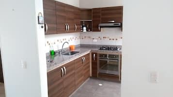 Family House, Multiple Beds, Accessible, Non Smoking | Private kitchen | Full-sized fridge, microwave, oven, cookware/dishes/utensils