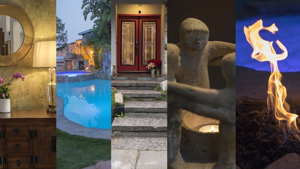 A pool, a stone statue, a red door, and a fire.
