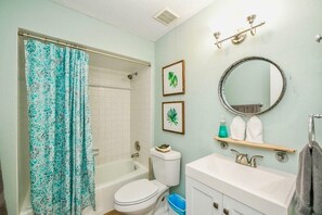 Hair dryer, towels, soap, shampoo
