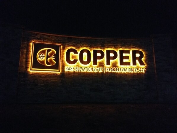 A sign with the word 'COPPER' and elevation details.