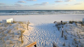On the beach, sun-loungers
