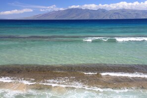 On the beach, sun-loungers, beach towels
