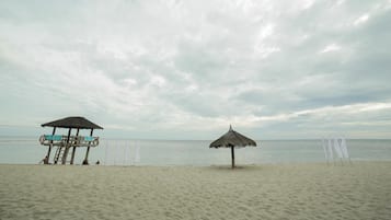 On the beach, beach volleyball