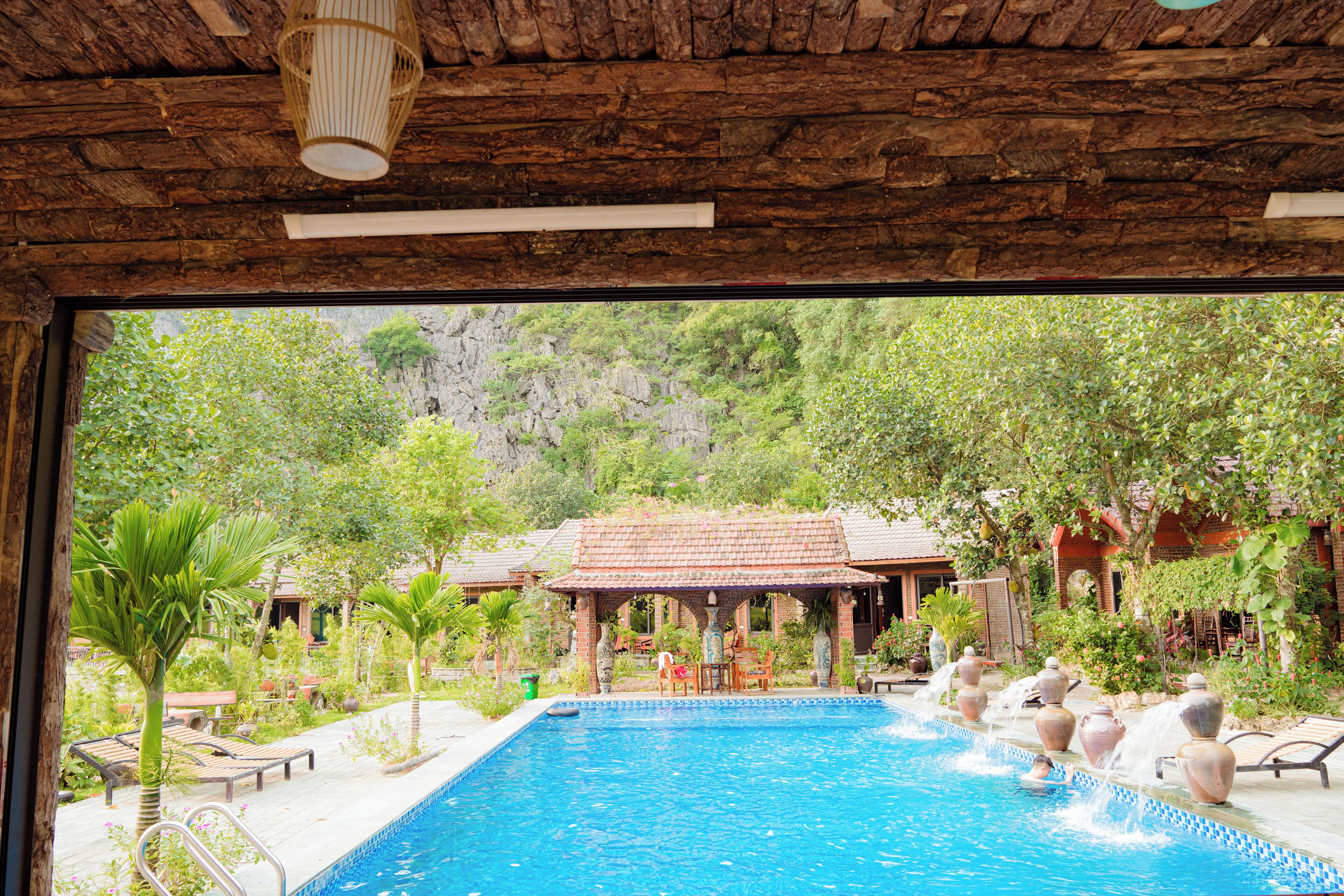 Outdoor pool, pool umbrellas, sun loungers