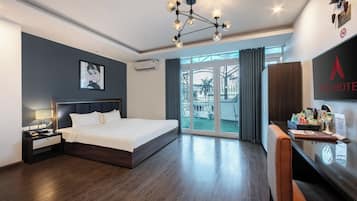 Deluxe Room, 1 King Bed, Balcony | 1 bedroom, minibar, in-room safe, blackout drapes