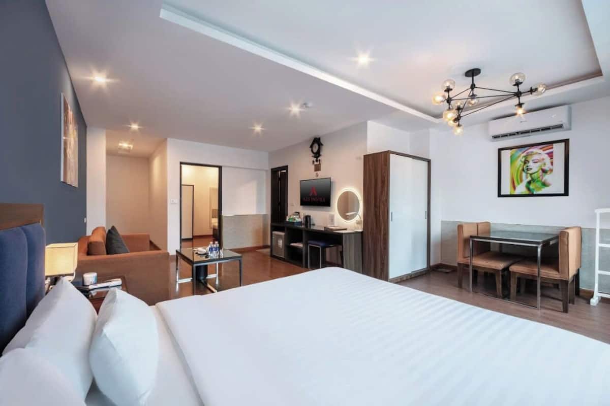 Deluxe-rum - 2 queensize-sängar - balkong | 1 sovrum, minibar och värdeförvaringsskåp på rummet