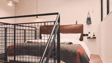 Premium bedding, down comforters, free minibar, in-room safe