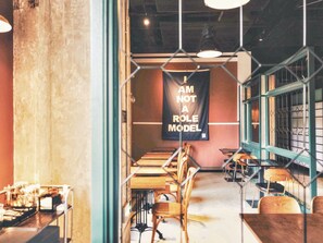 Breakfast, lunch, dinner served; Fusion cuisine, garden views 