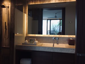 Shower, hair dryer, towels, soap