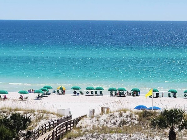 On the beach, sun-loungers
