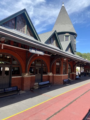 A train station with a prominent 'Jim Thorpe' sign, brick architecture, and a distinctive tower. - Book for Winter and Spring!  Great rates! Family and dog friendly! (Lake Harmony)