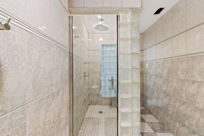 Bathtub, hair dryer, towels, soap