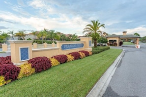 Welcome to Paradise Palms, where lush greenery and modern architecture blend in harmony.
