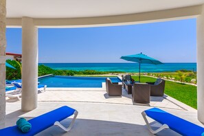 Outdoor pool, a heated pool - CASA FLOR DE MAYO 5 BEDROOM OCEANFRONT INFINITY POOL (Isla Mujeres)