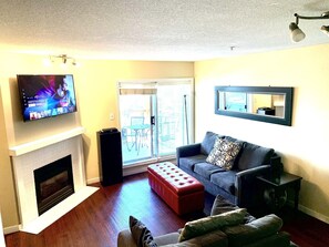  Bright, Comfortable Living Room with Smart TV, For Your Enjoyment. 