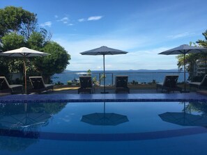 Outdoor pool, pool umbrellas, pool loungers