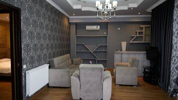 38-inch LED TV with premium channels, TV