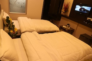 Blackout curtains, iron/ironing board, free WiFi, bed sheets