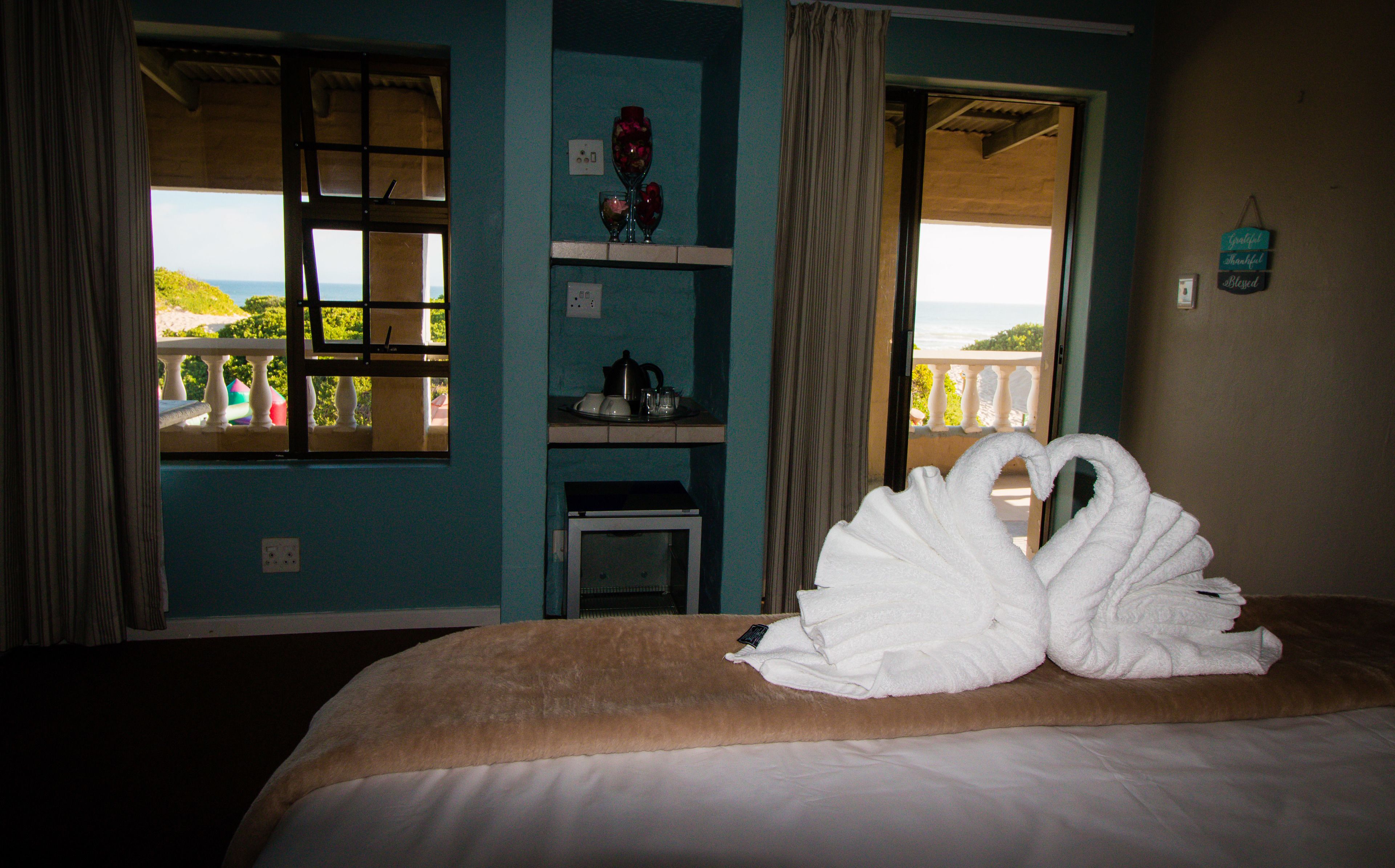 Honeymoon Room, Partial Sea View | In-room safe, blackout curtains, soundproofing, free WiFi