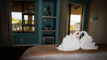 Honeymoon Room, Partial Sea View | In-room safe, blackout curtains, soundproofing, free WiFi