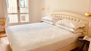 Double Room, Balcony, City View | Minibar, in-room safe, desk, soundproofing