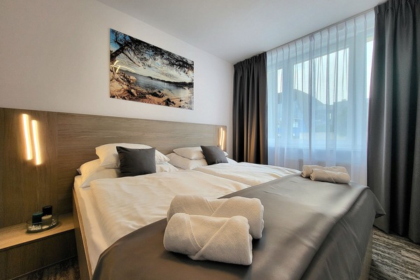 Deluxe Room | Select Comfort beds, in-room safe, desk, laptop workspace