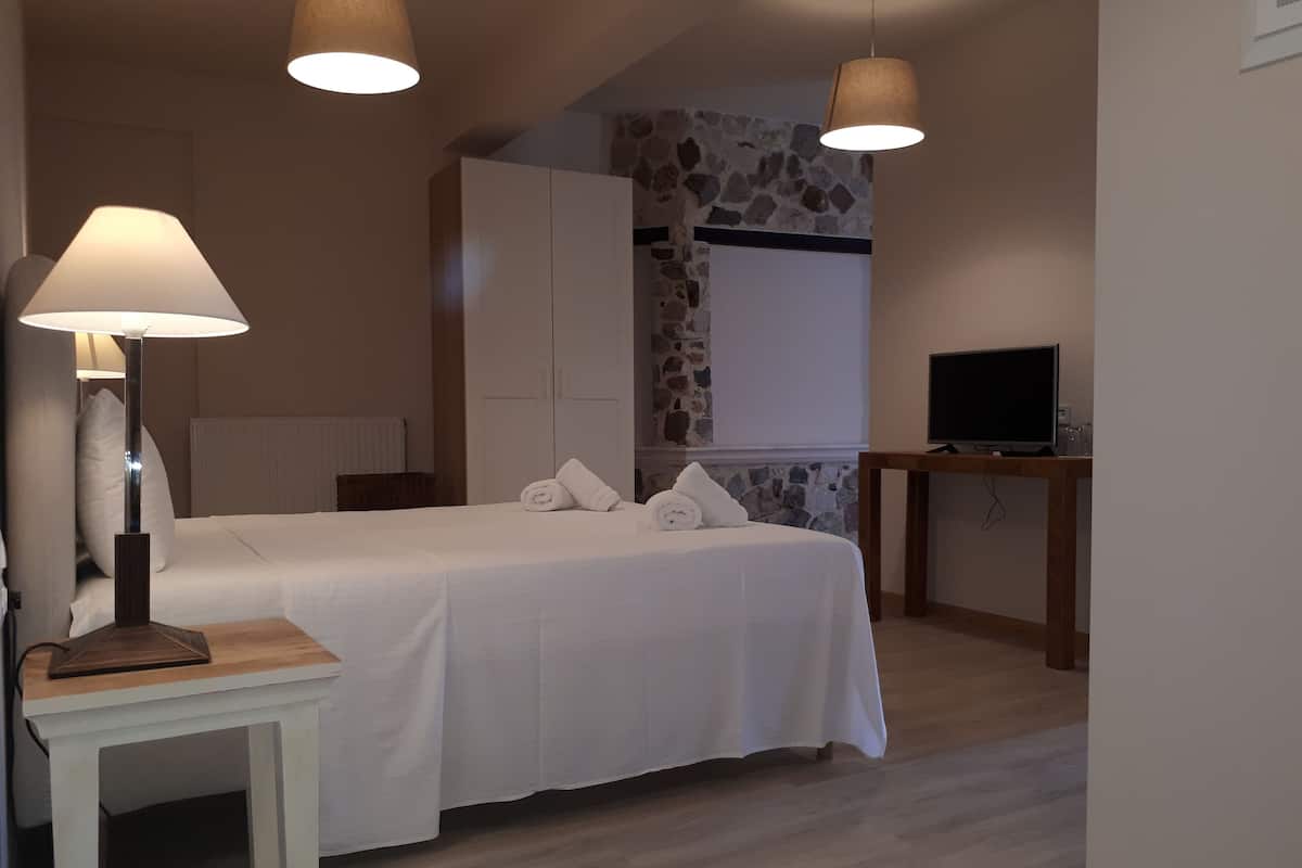 Deluxe Suite (Ground floor Street view) | Soundproofing, iron/ironing board, free WiFi, bed sheets