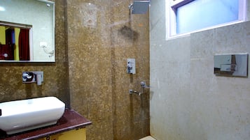 Shower, free toiletries, slippers, towels