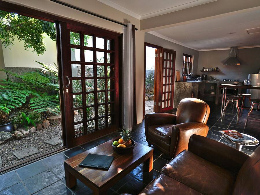 Basic Studio, Non Smoking | Living area | 28-inch flat-screen TV with satellite channels, TV