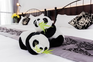 Premium bedding, down duvets, blackout curtains, soundproofing